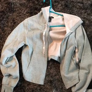 cropped gray and light pink sweatshirt